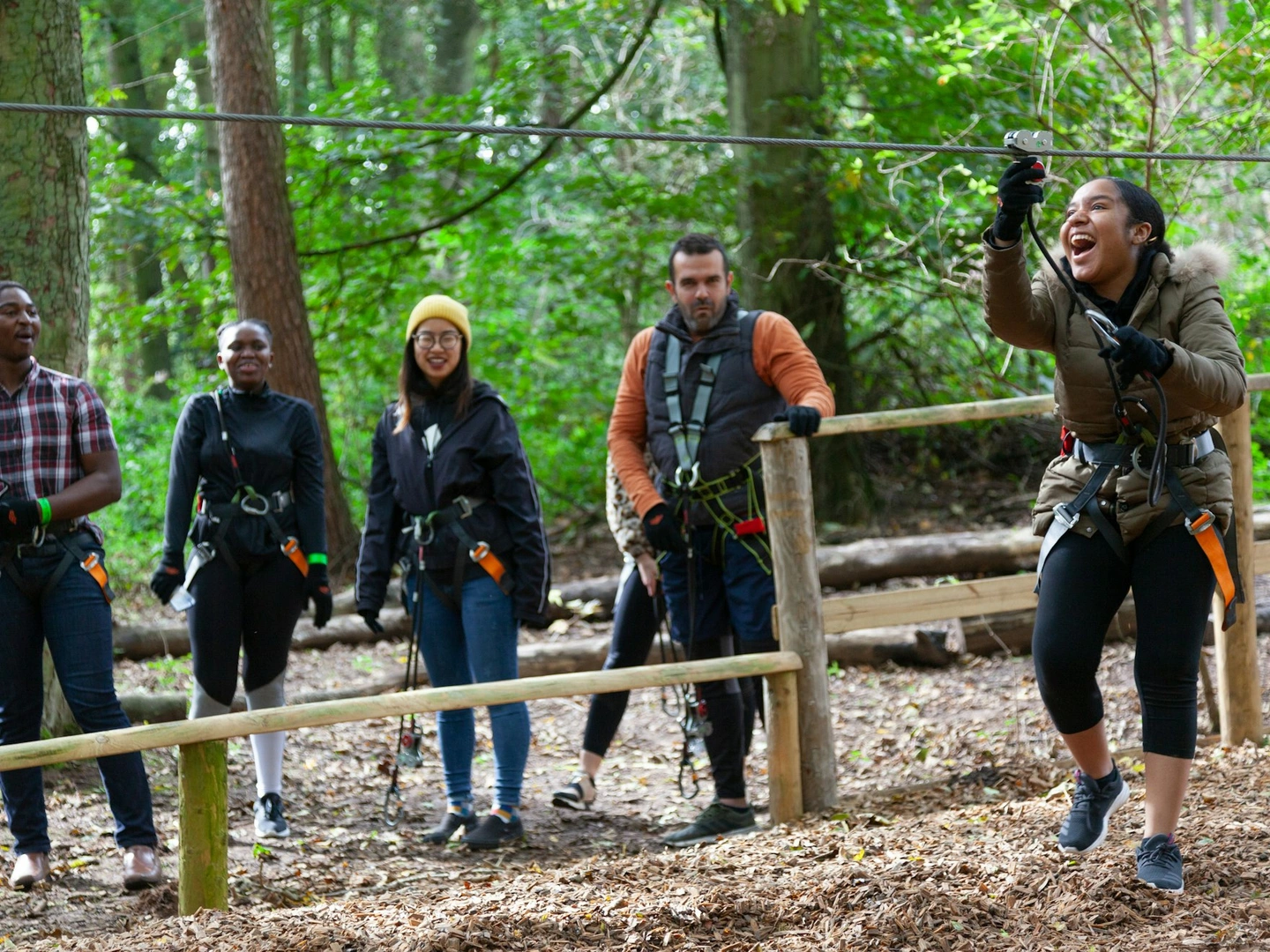 Teamwork in action – Students learn to trust, communicate, and support each other as they tackle our epic treetop crossings and zips.