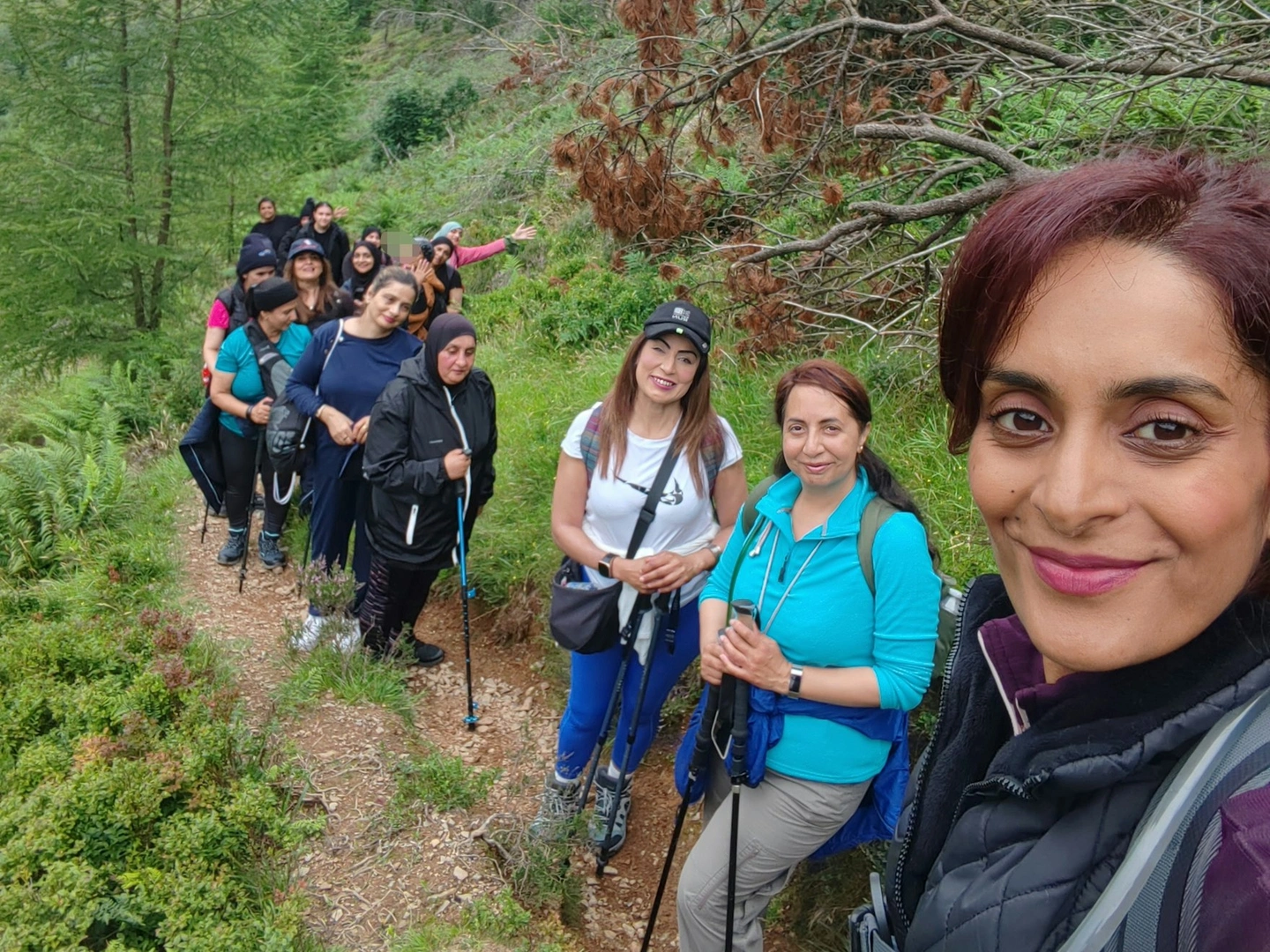 Walking group on a trail.